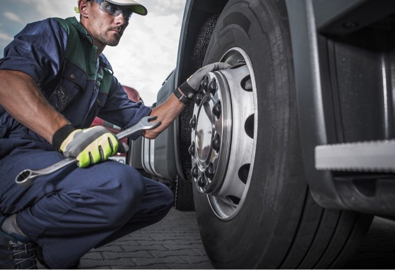 A man fixing a tire