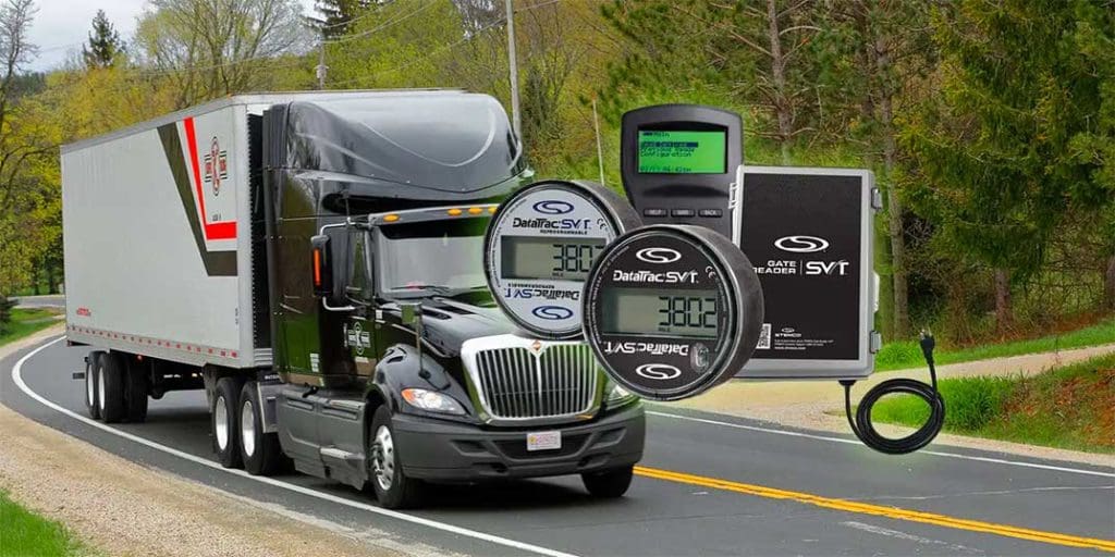semi on a road with gate reader svt products in front of it